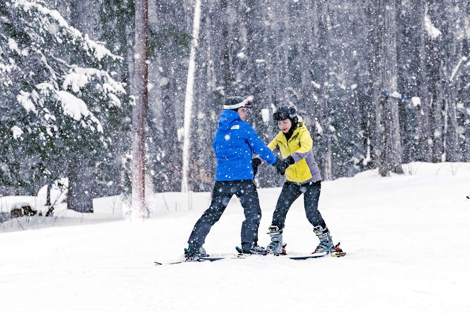 A ski instructor and her student — Mont Rigaud, ski resort, snowboarding, alpine touring, mountain biking, and hiking, family-friendly, in Rigaud, Quebec, near Montreal